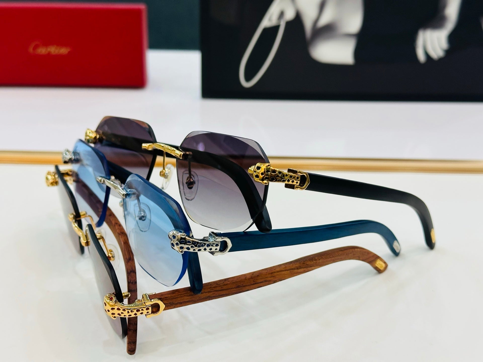 CARTIER PANTHÈRE RIMLESS OVAL FRAME SUNGLASSES 543637 IN METAL