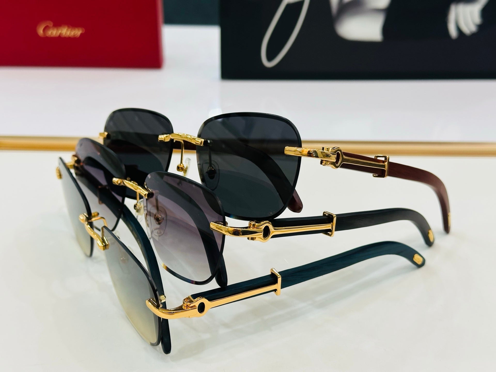 CARTIER RIMLESS SQUARE FRAME SUNGLASSES CT0605S IN METAL AND WOODEN