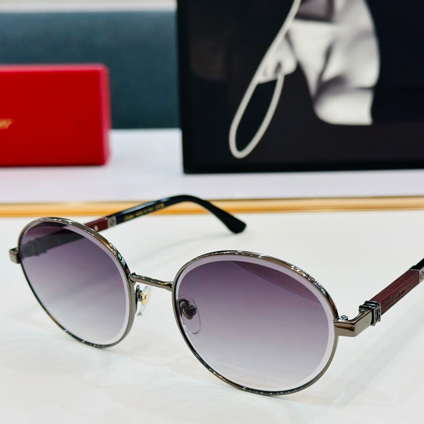 CARTIER PREMIÈRE ROUND FRAME SUNGLASSES CT0490S IN METAL