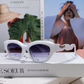 MIU MIU LOGO CAT EYE SUNGLASSES 513007 IN WHITE ACETATE WAVY FRAME
