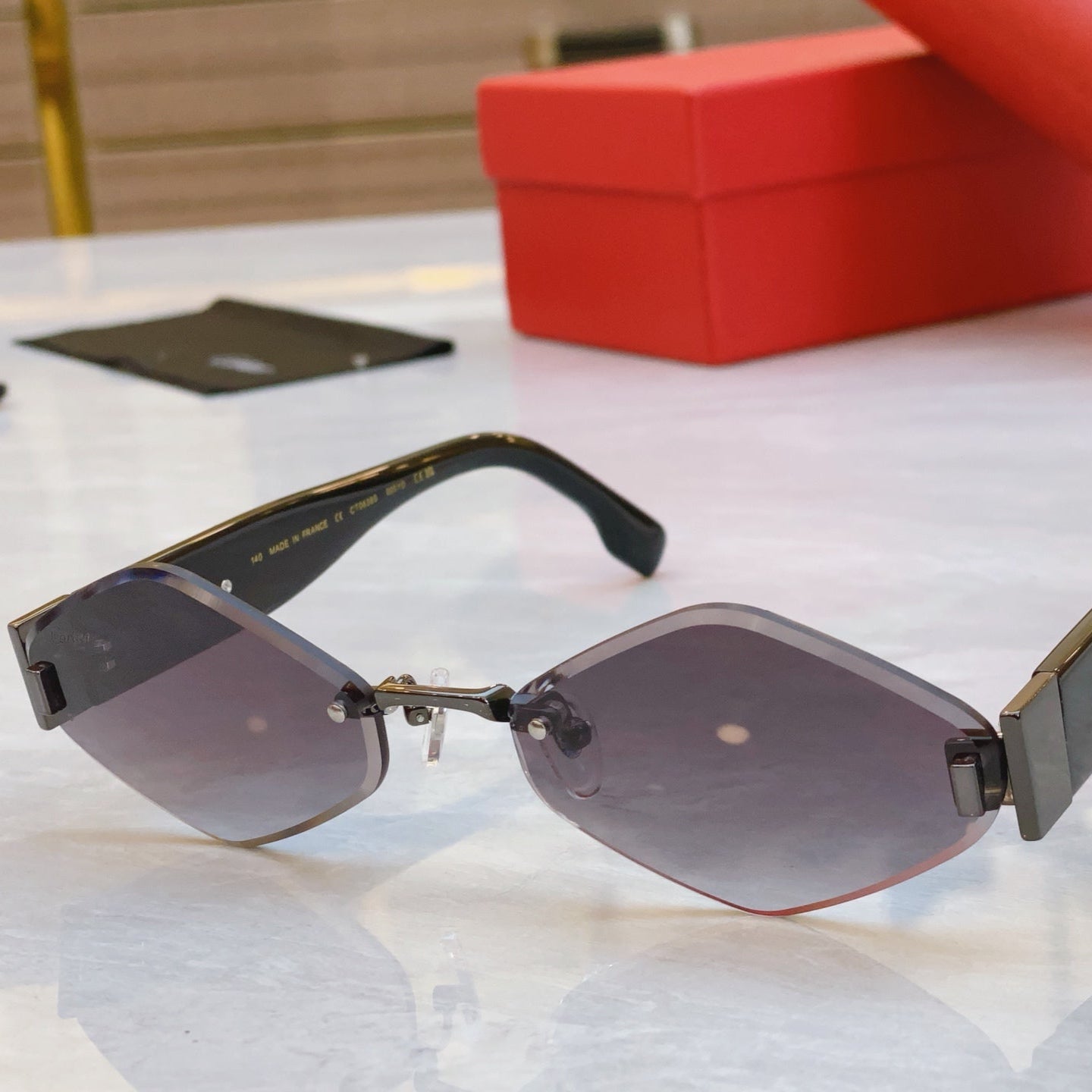 CARTIER PANTHÈRE RHOMBUS FRAME SUNGLASSES CT00638S IN METAL AND ACETATE